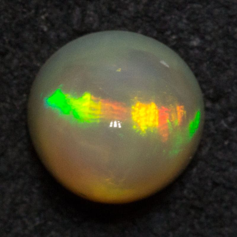 0.72 ct dark opal 5.3x5.3x4.9mm