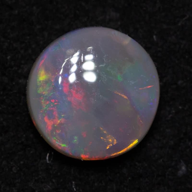0.72 ct dark opal 6.6x6x2.5mm