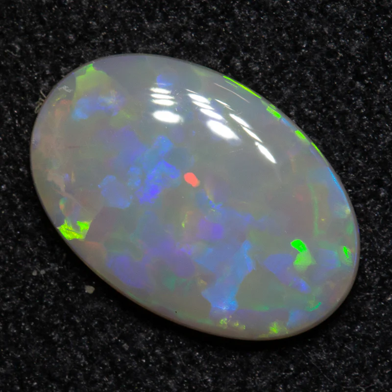 0.72 ct dark opal 9.2x6.2x1.8mm