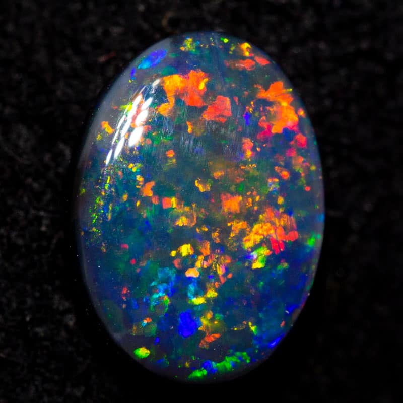 0.72 ct gem black opal 7.5x5.5x2.5mm