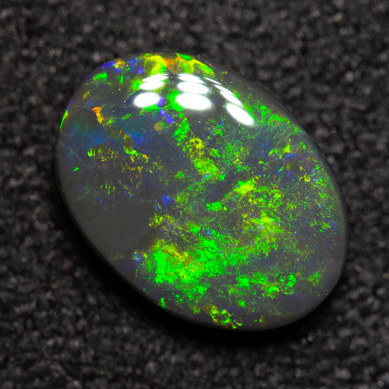 0.73 ct black opal 7.5x5.5x2.6mm