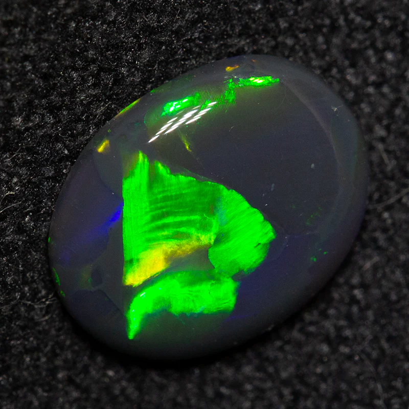 0.73 ct black opal 8.4x6.7x2.1mm