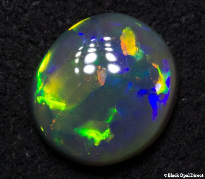 0.73 ct gem black opal 7x6x2.5mm