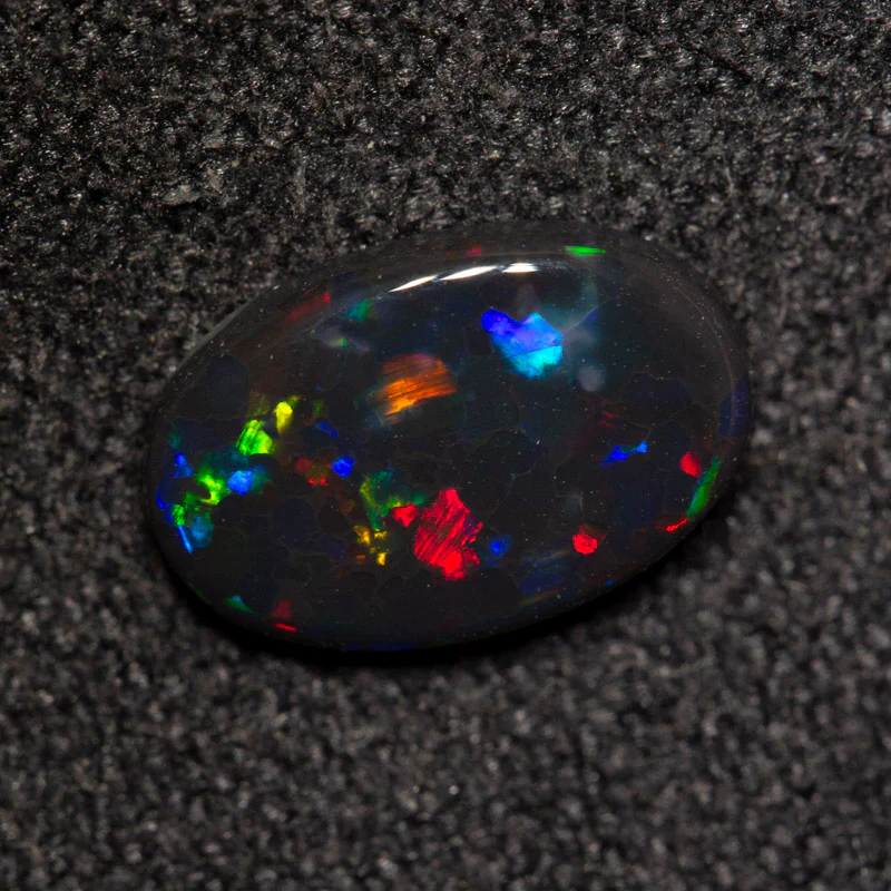 0.74 ct black opal 8.8x5.8x2.1mm