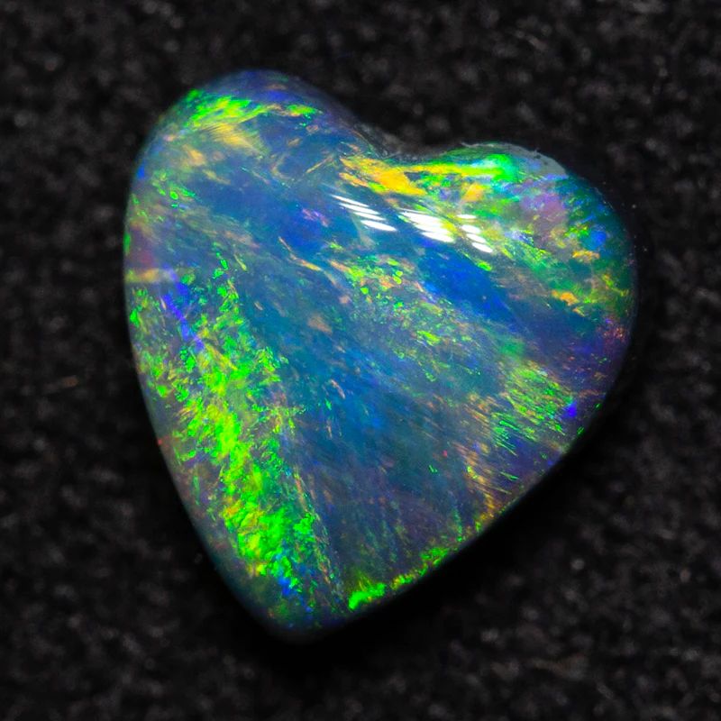 0.74 ct dark opal 6.3x6.2x.3.2mm
