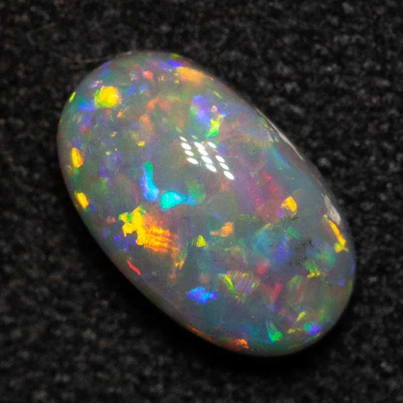 0.74 ct dark opal 7.5x4.5x3.1mm