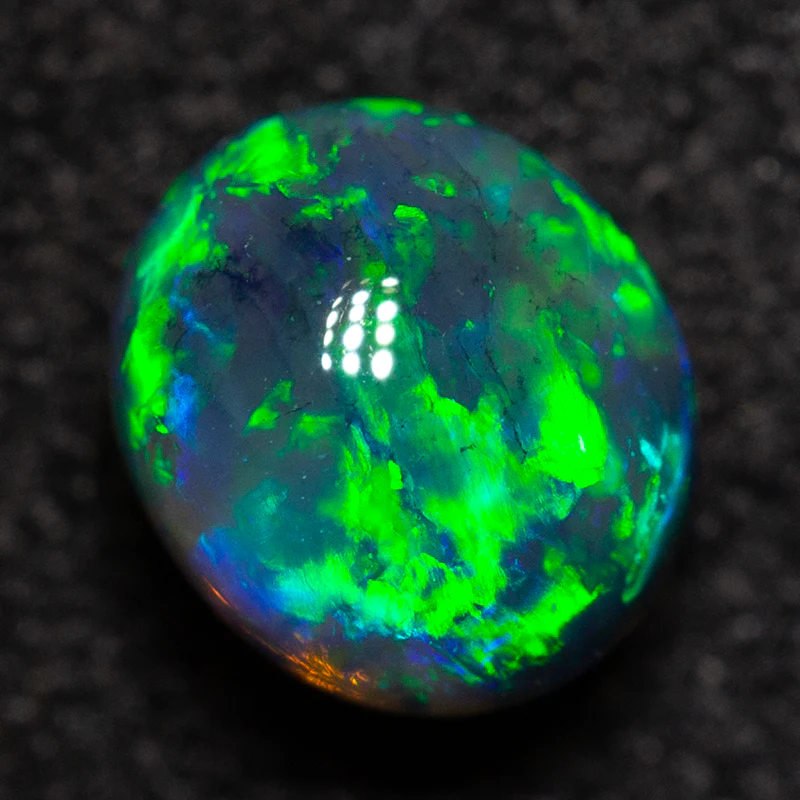 0.75 ct black crystal opal 5.5x4.8x4.7mm