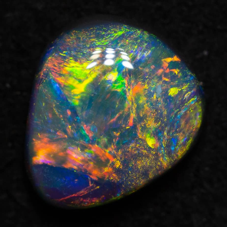0.75 ct black opal 6.7x5.9x2.7mm