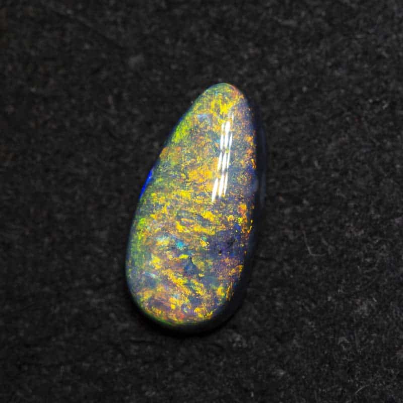 0.75 ct black opal 8.8x4.4x2.7mm