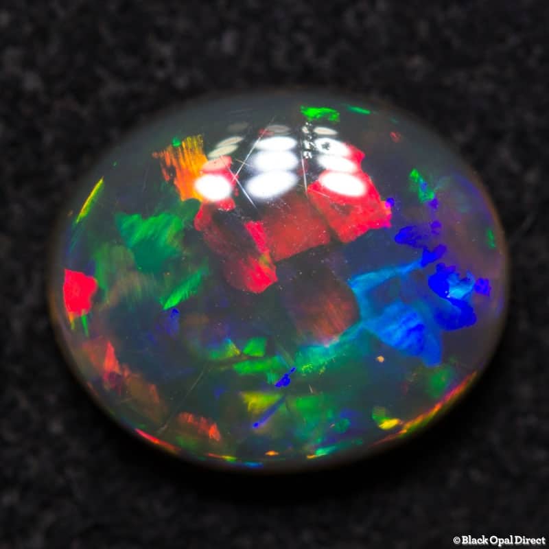 0.75 ct gem black crystal opal 7x6x2.5mm