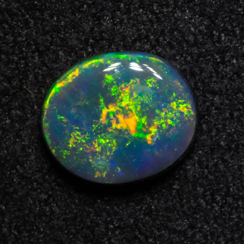 0.76 ct black opal 6.9x5.8x2.6mm