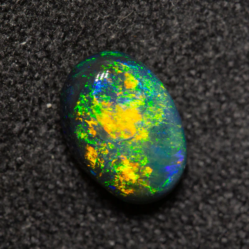 0.76 ct black opal 7.3x5.1x3.1mm