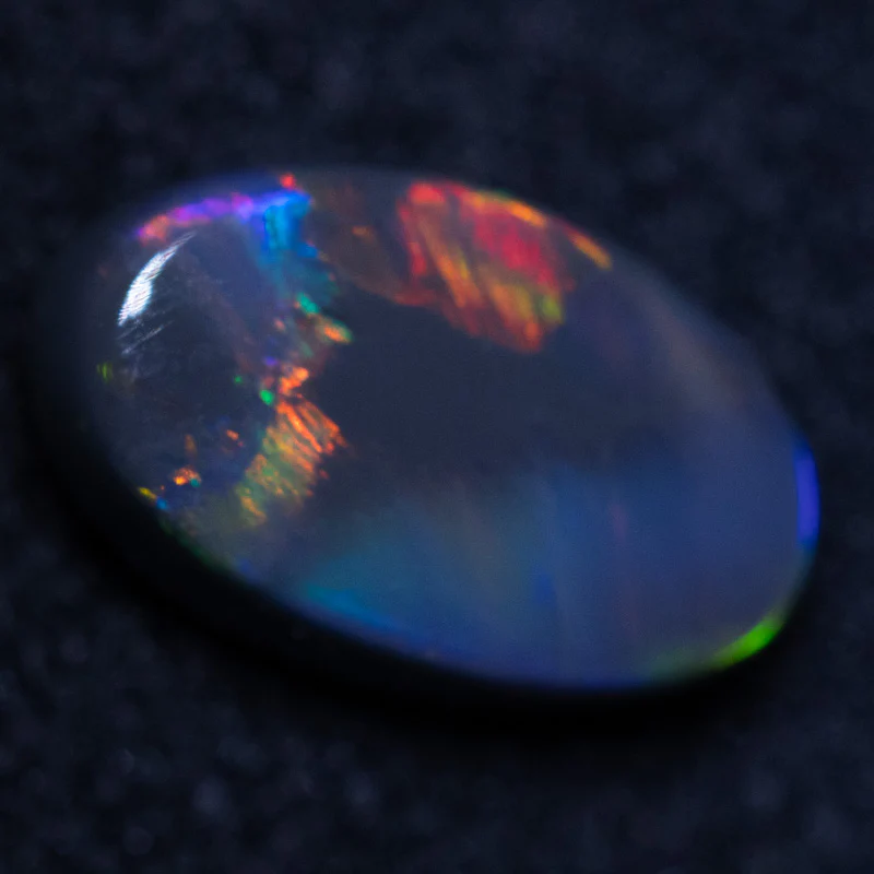 0.76 ct black opal 7.9x4.9x2.9mm