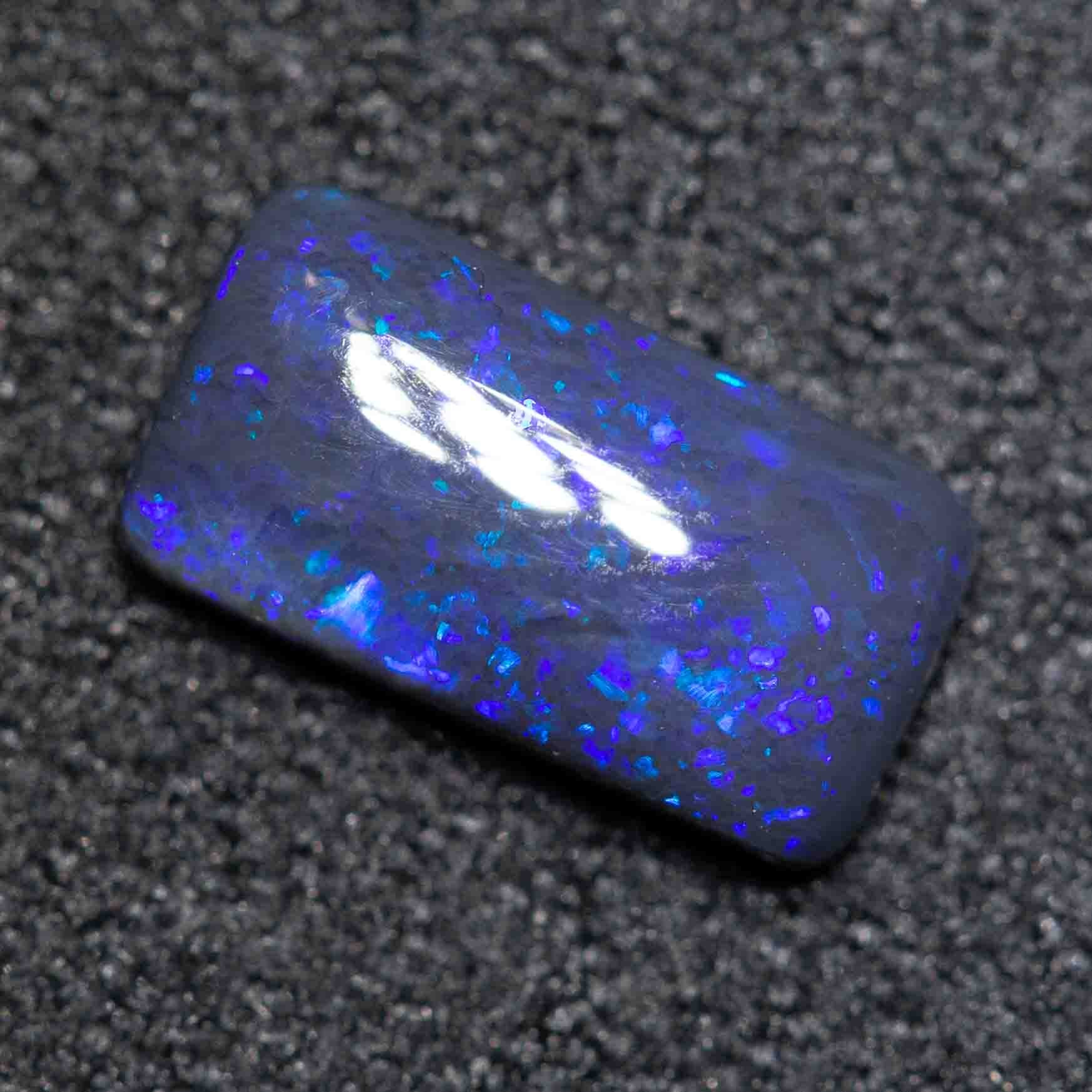 0.76 ct black opal 8.5x4.6x2.4mm