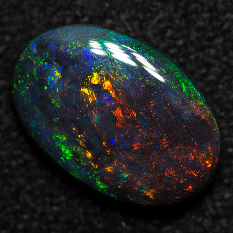 0.76 ct black opal 8.6x5.7x2.4mm