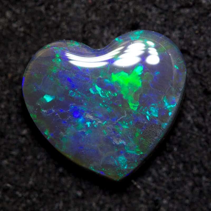 0.76 ct black opal heart 7.4x6.7x2.2m