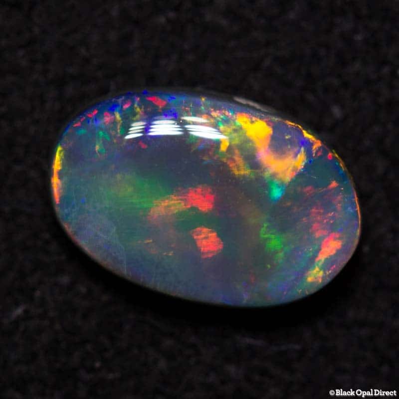 0.76 ct semi black opal 7.5x5x3.5mm