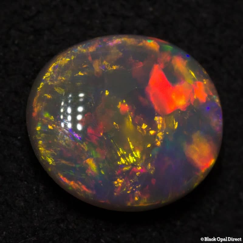 0.76 ct semi black opal 7x6x3.5mm