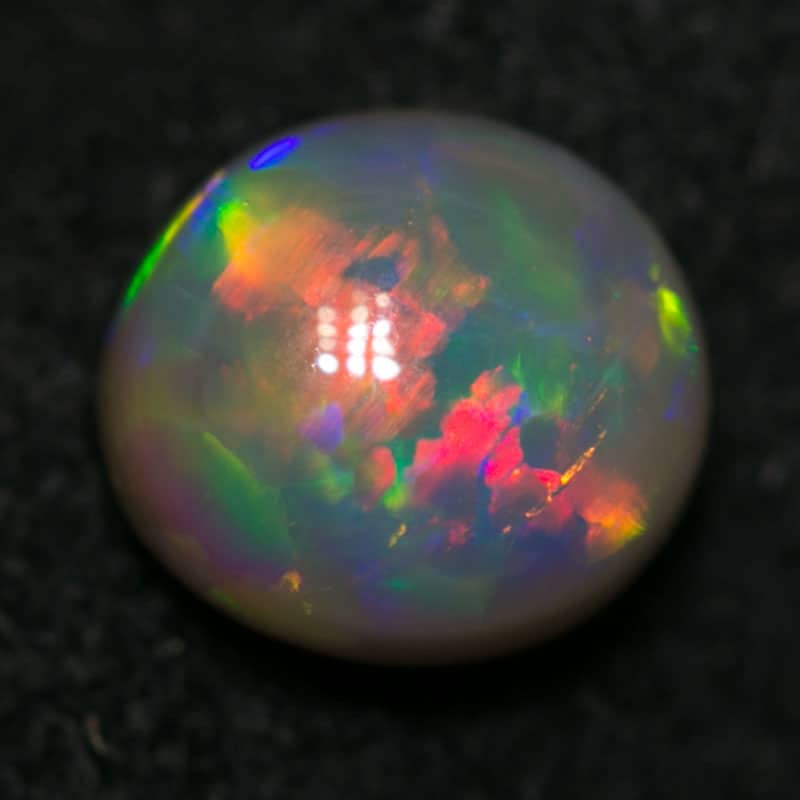0.77 ct dark cats eye pattern 6x5.5x3mm