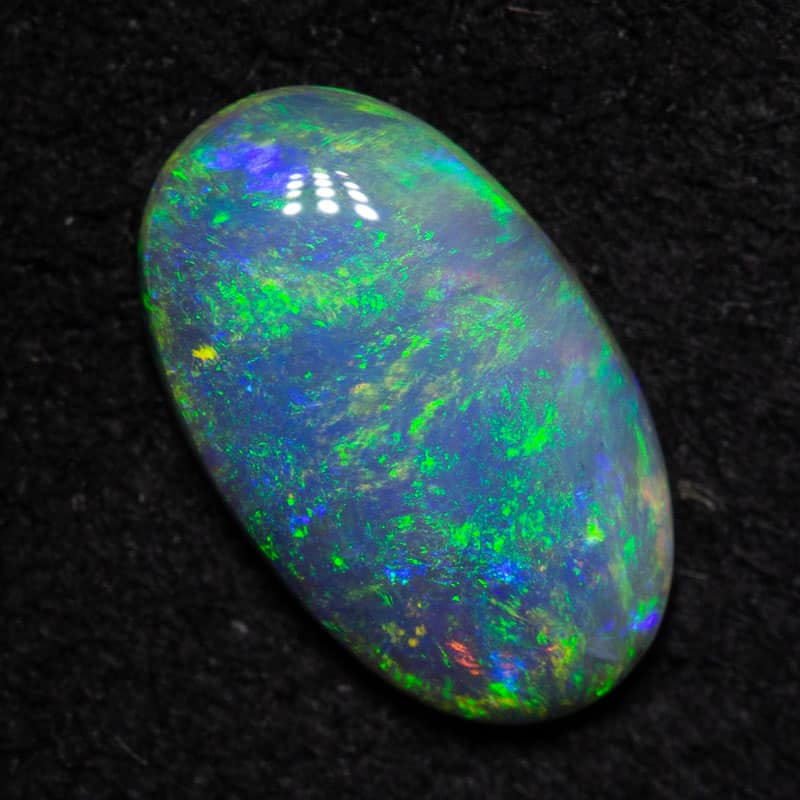 0.77 ct dark opal 9.4x5.6x2.1mm