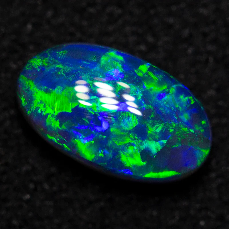 0.78 ct black crystal opal 7.5x4.4x3.2mm