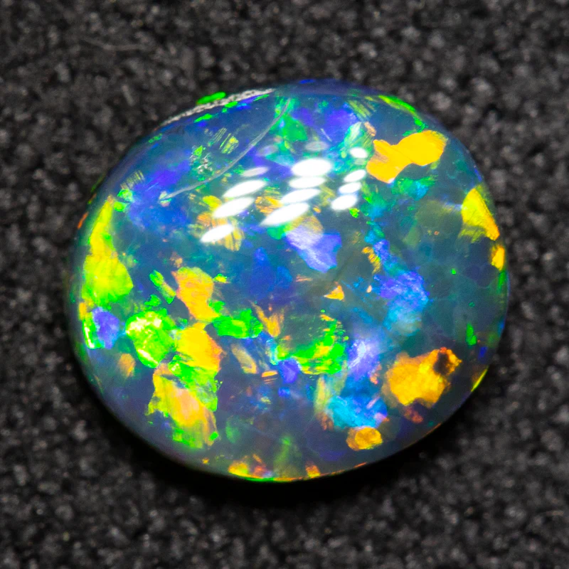 0.78 ct black opal 7x6.3x2.7mm