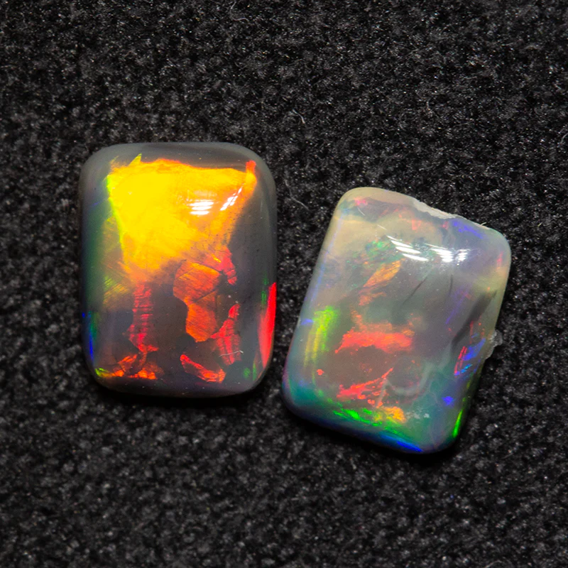 0.78 ct black opal pair 5.7x4.3x2mm