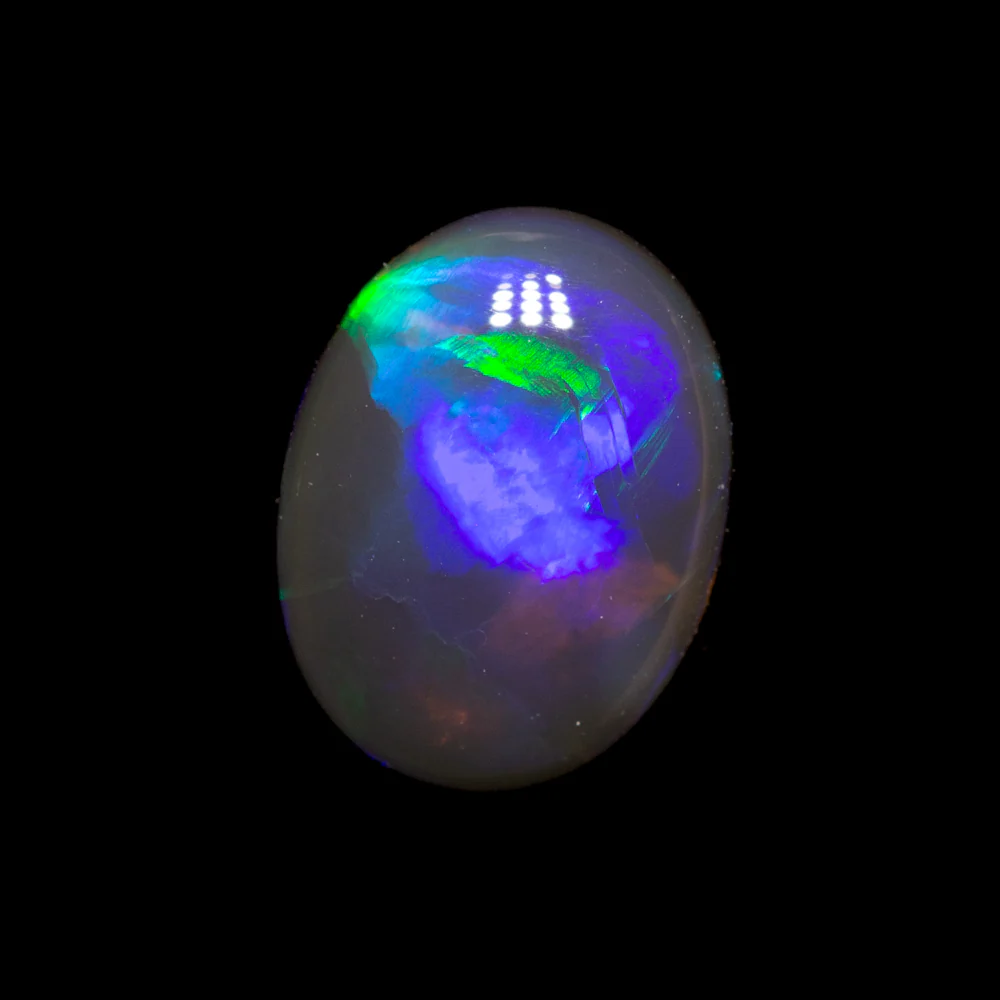 0.79 ct black crystal opal 7.8x5.9x2.6mm