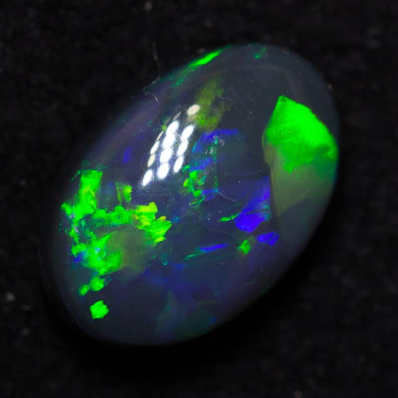 0.79 ct black opal 7.5x5x3mm