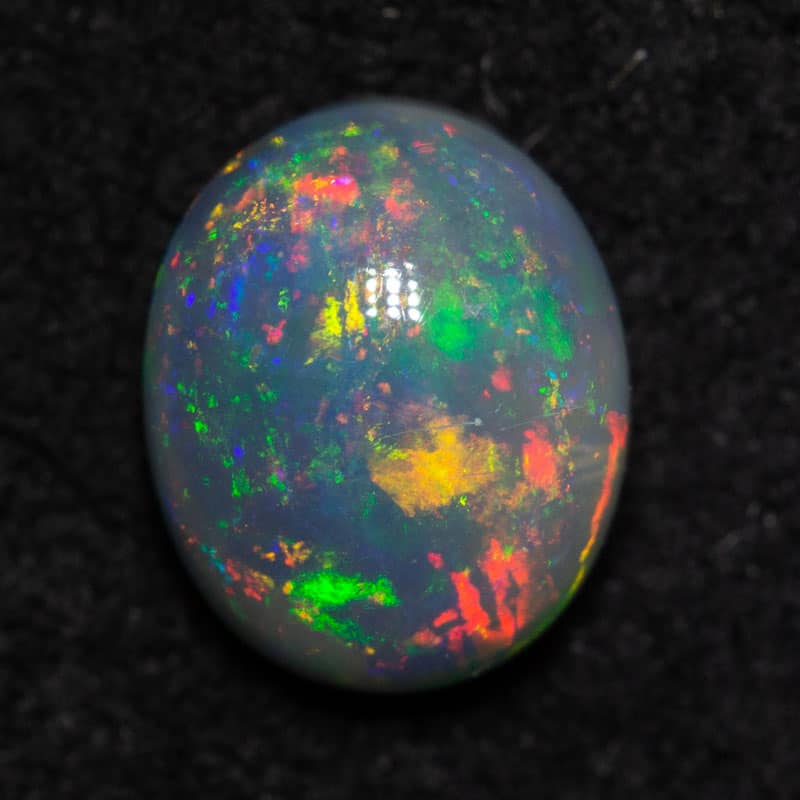 0.79 ct black opal 7x5.8x3.3mm