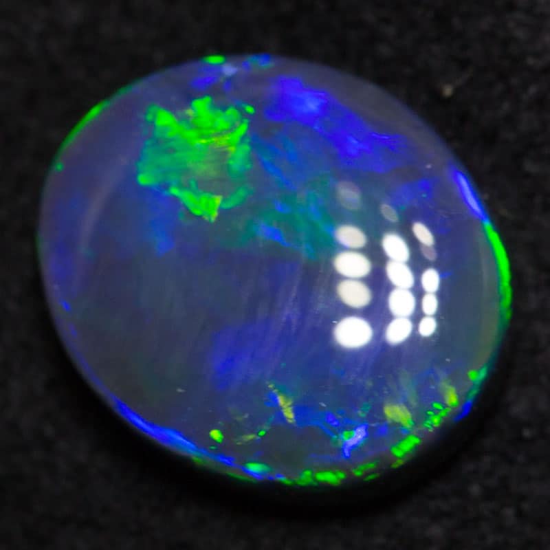 0.79ct black opal 7.4x6.4x2.3mm