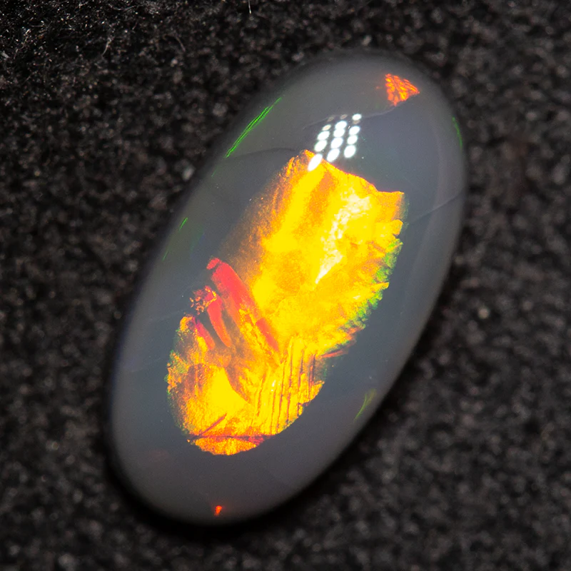 0.80 ct black opal 9x4.9x2.6mm