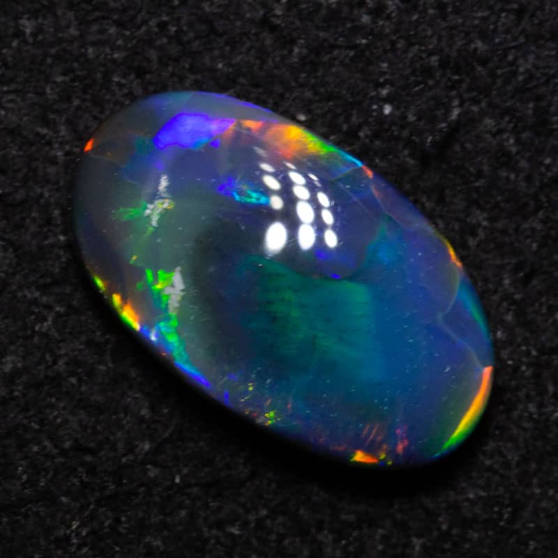 0.80 ct black opal 9x5.3x2.4mm