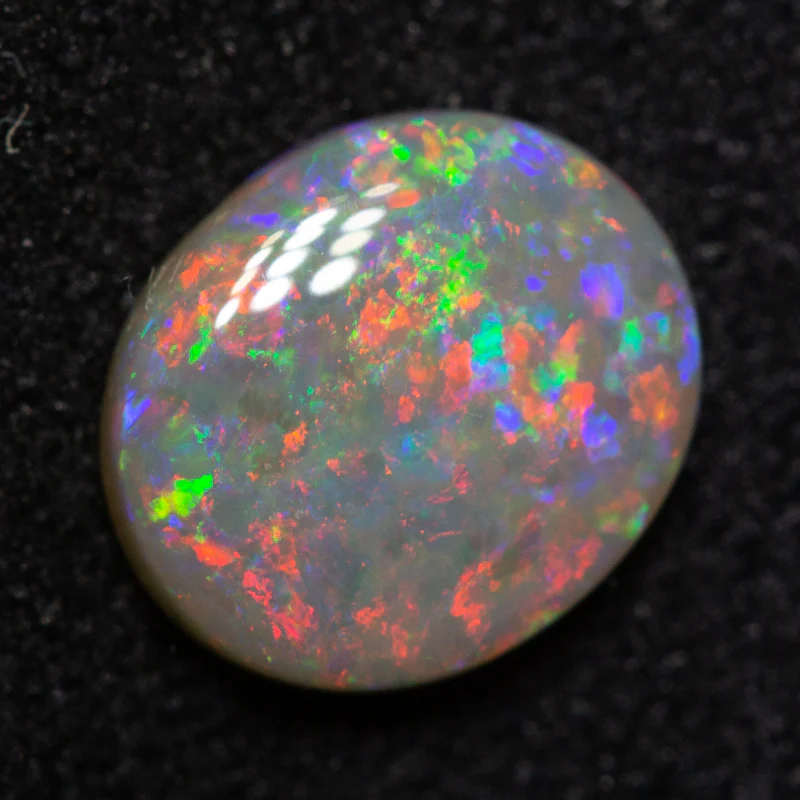 0.80 ct dark opal 7.3x6.4x2.4mm