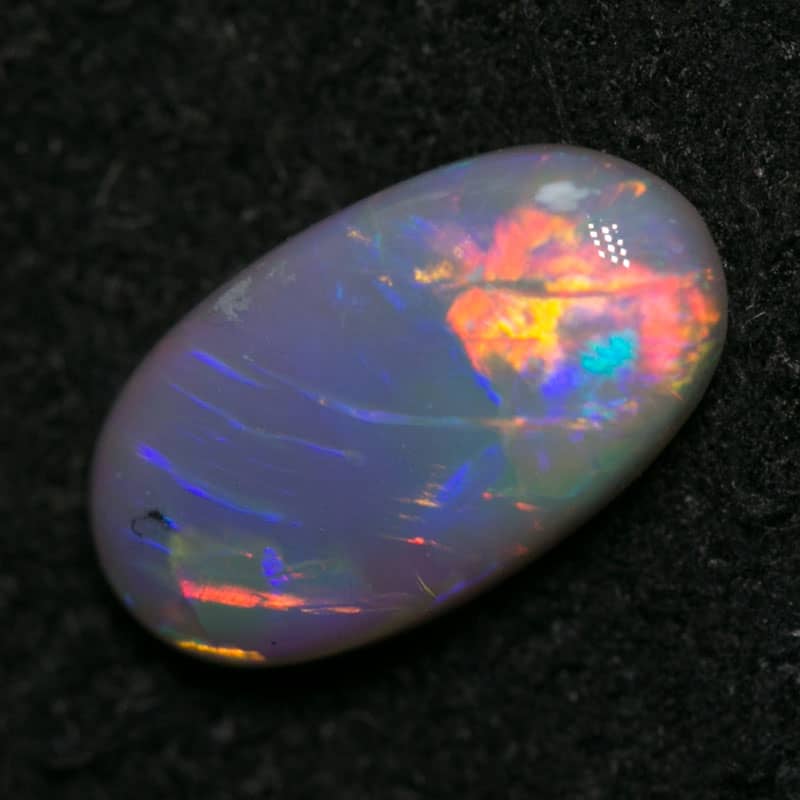 0.80 ct dark opal 9x5x2mm