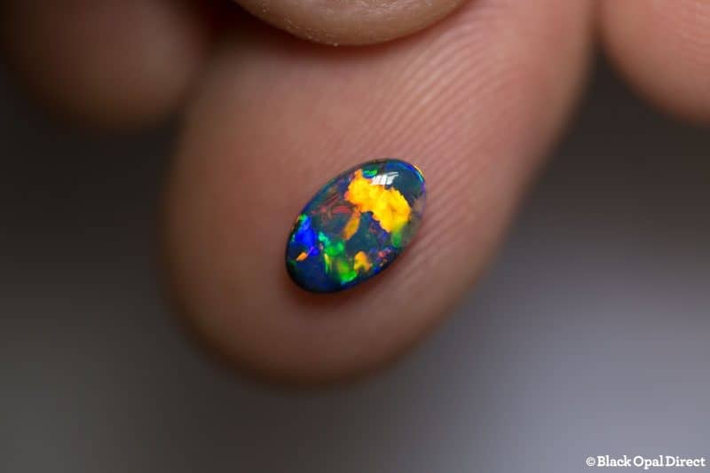 0.80 ct gem black opal 8.5x5x3mm
