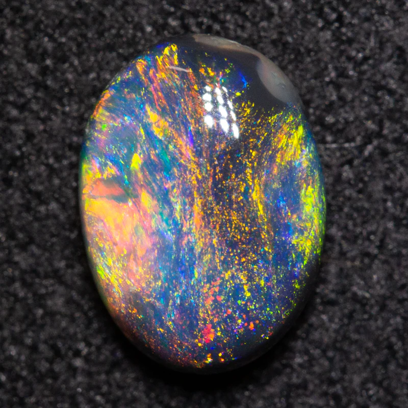 0.81 ct black opal 7.8x5.6x3mm