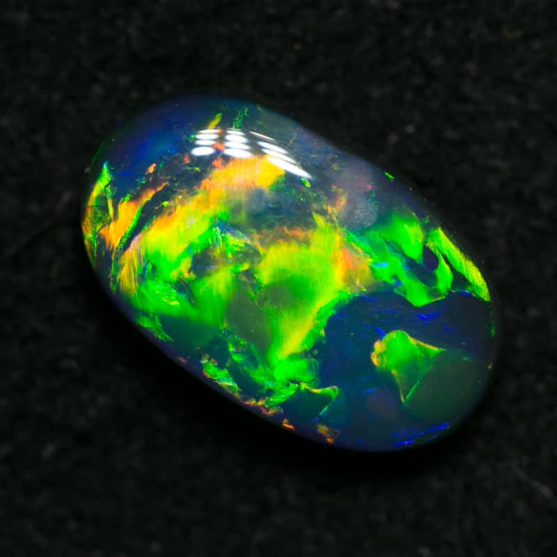 0.81 ct black opal gem 8.5x5x2.5mm