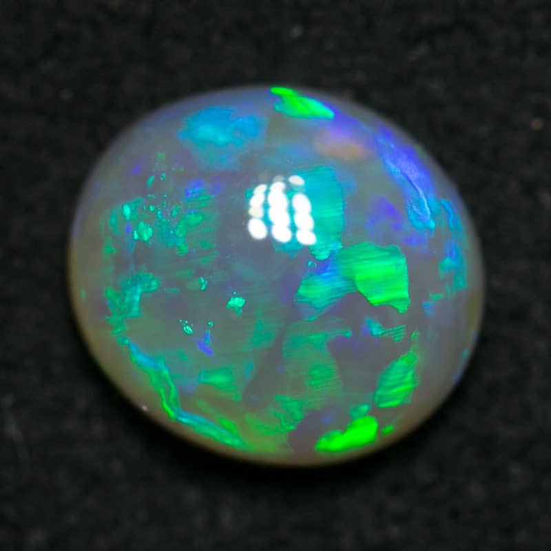 0.81 ct green crystal opal 7x6x3mm