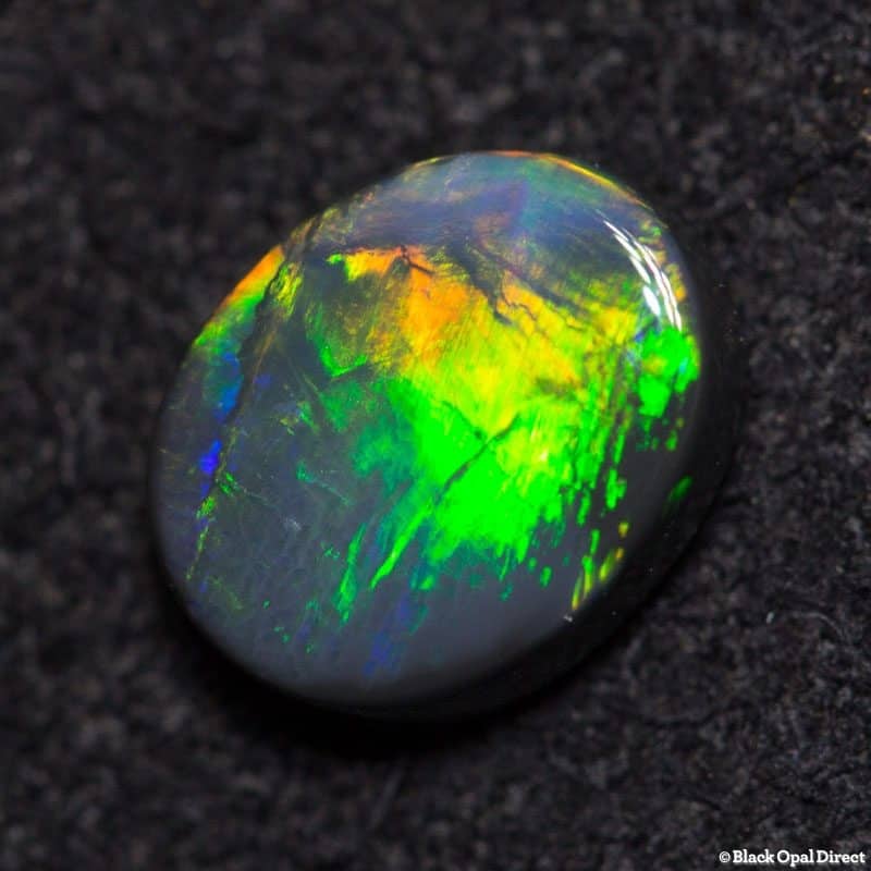 0.82 ct black opal 7x5.5x2mm