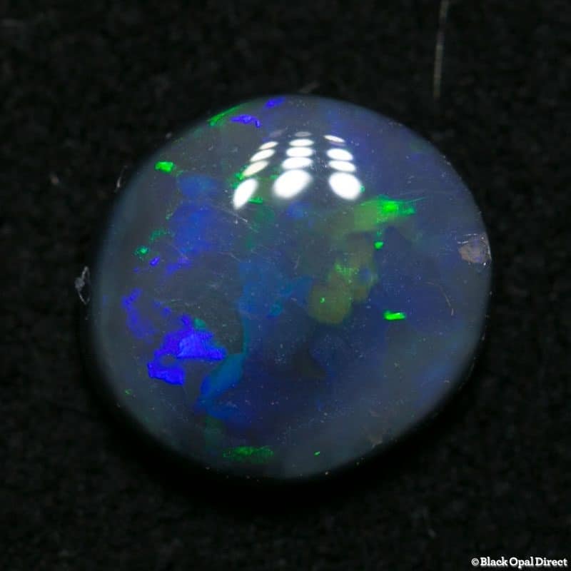 0.82 ct black opal 7x6x2.5mm