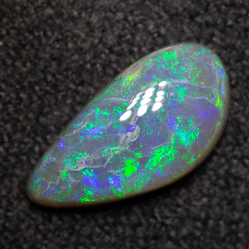 0.82 ct black opal 9.8x5.1x2.7mm