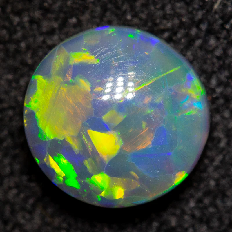 0.82 ct dark opal 6.4x6.2x3.2mm