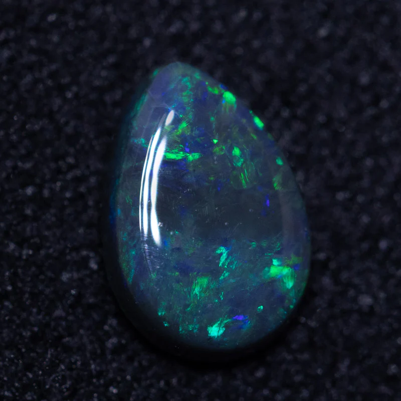 0.38 ct black opal 6.6x4.6x1.8mm