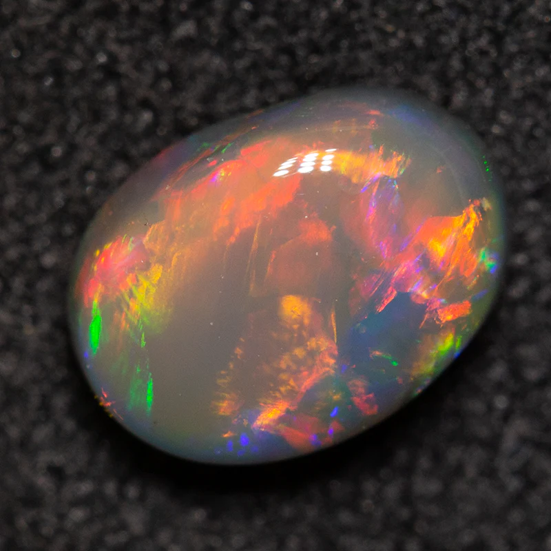 0.83 ct black opal 7.3x5.3x3.3mm