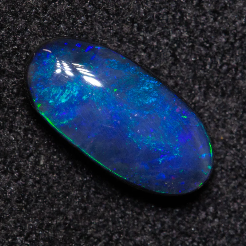 0.83 ct black opal 9.2x4.5x3mm