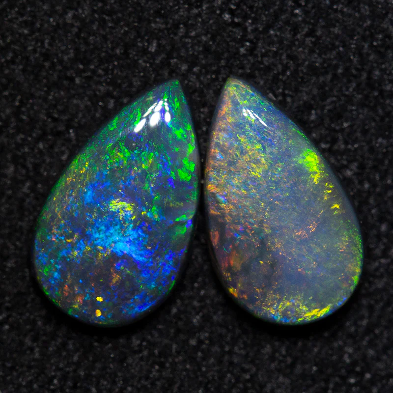 0.83 ct black opal pair 7.3x4.4x1.8mm