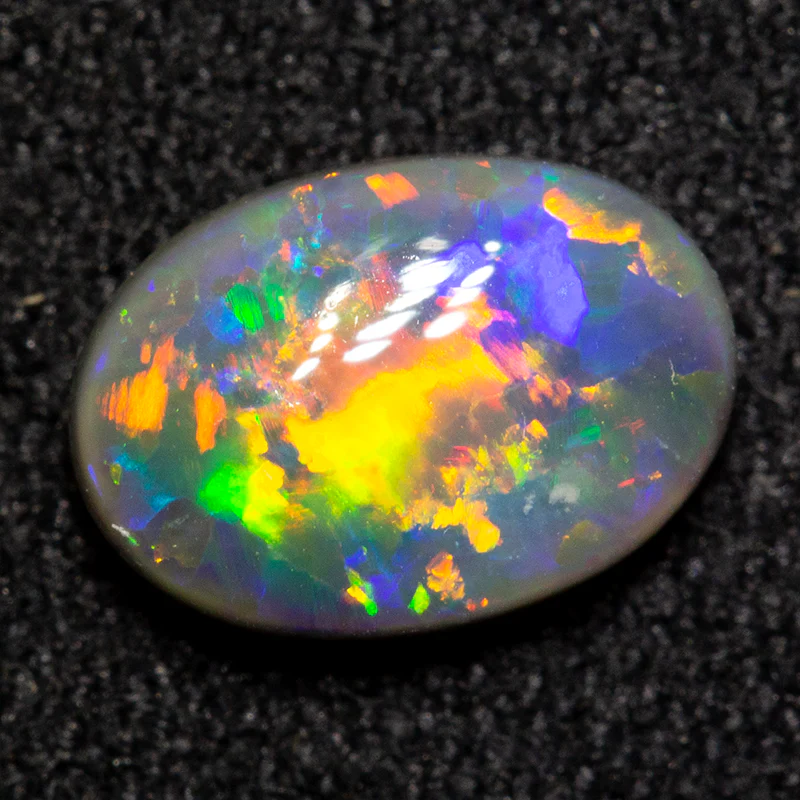 0.83 ct dark opal 8.1x5.7x2.9mm
