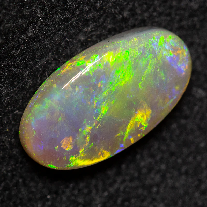 0.83 ct dark opal 9x5x2mm