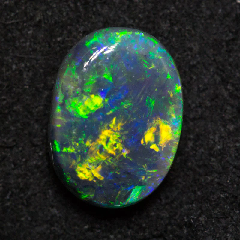 0.84 ct black opal 7.5x5.5x3mm